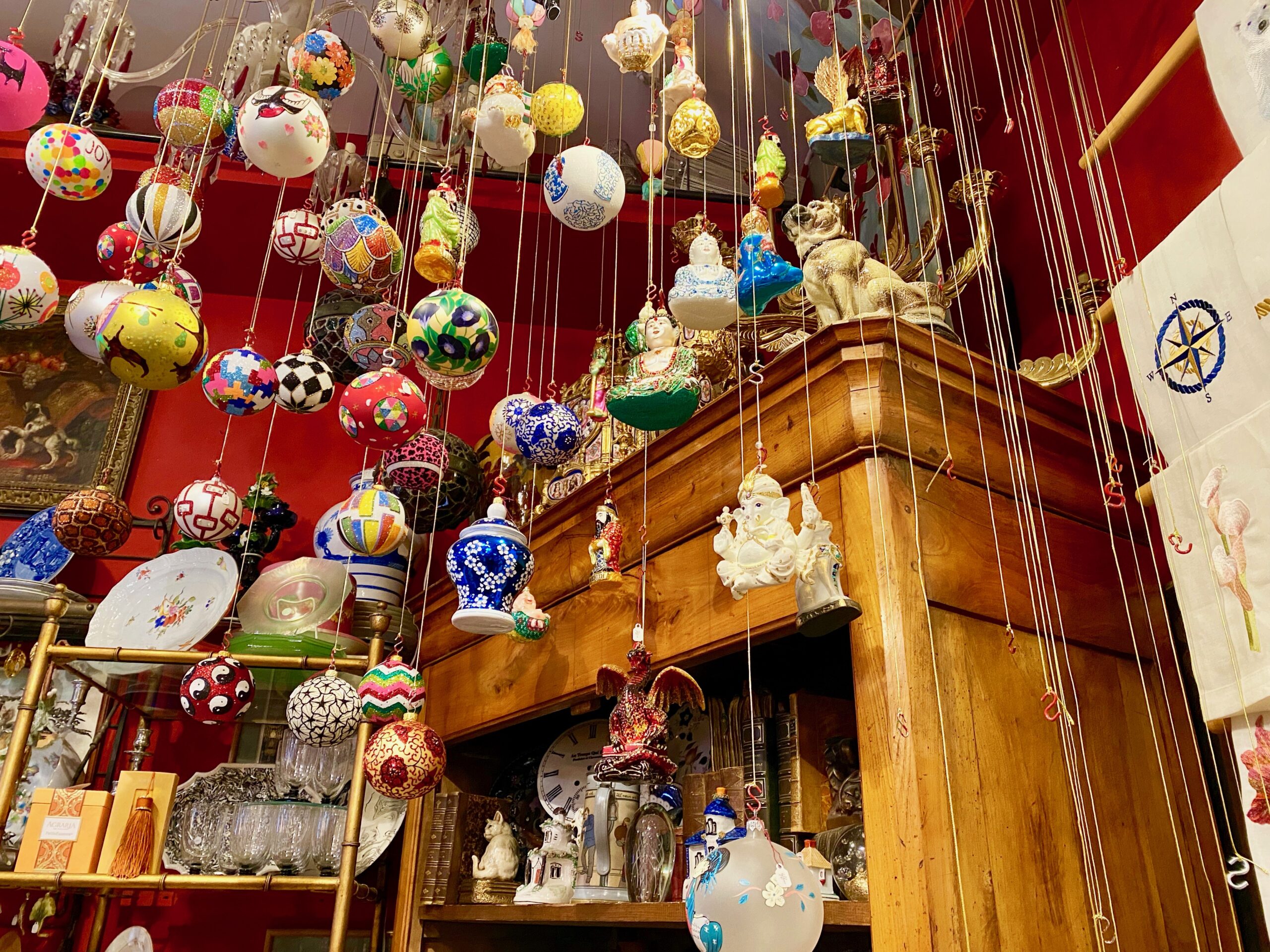 ornaments suspended from the ceiling at More and More Antiques in NYC