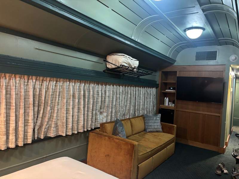 Interior of train car, remade as a hotel room