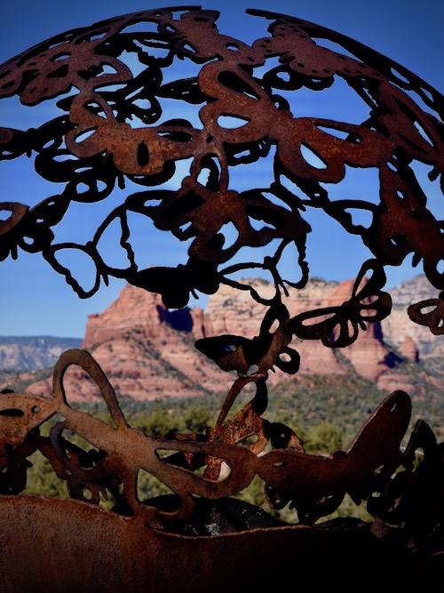 Red rocks seen through butterfly orb at Mariposa - taking photographs is one of the free things to do in Sedona