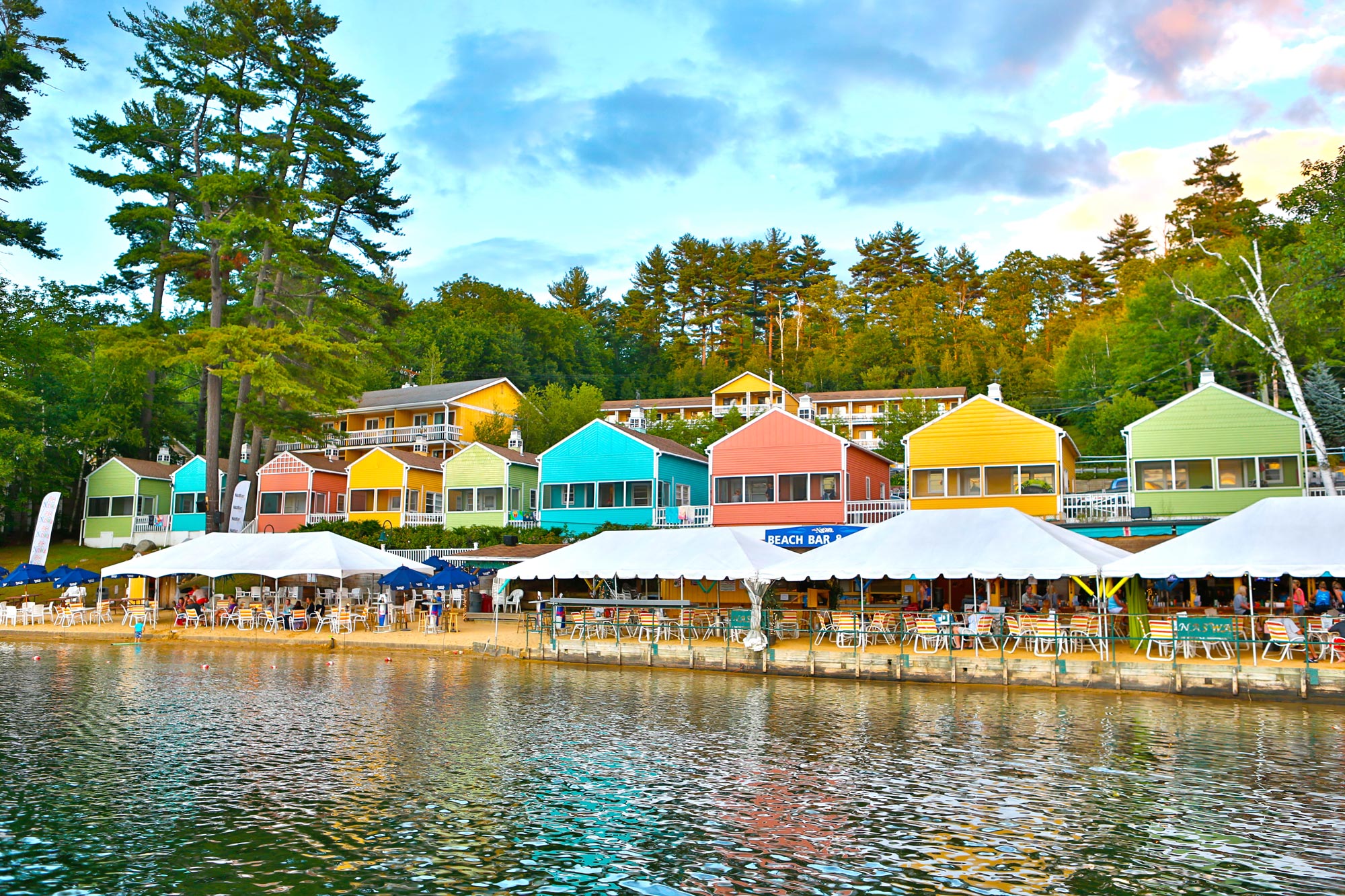 Colorful houses along the shore of Lake Winnipesaukee, one of the best lake towns in America