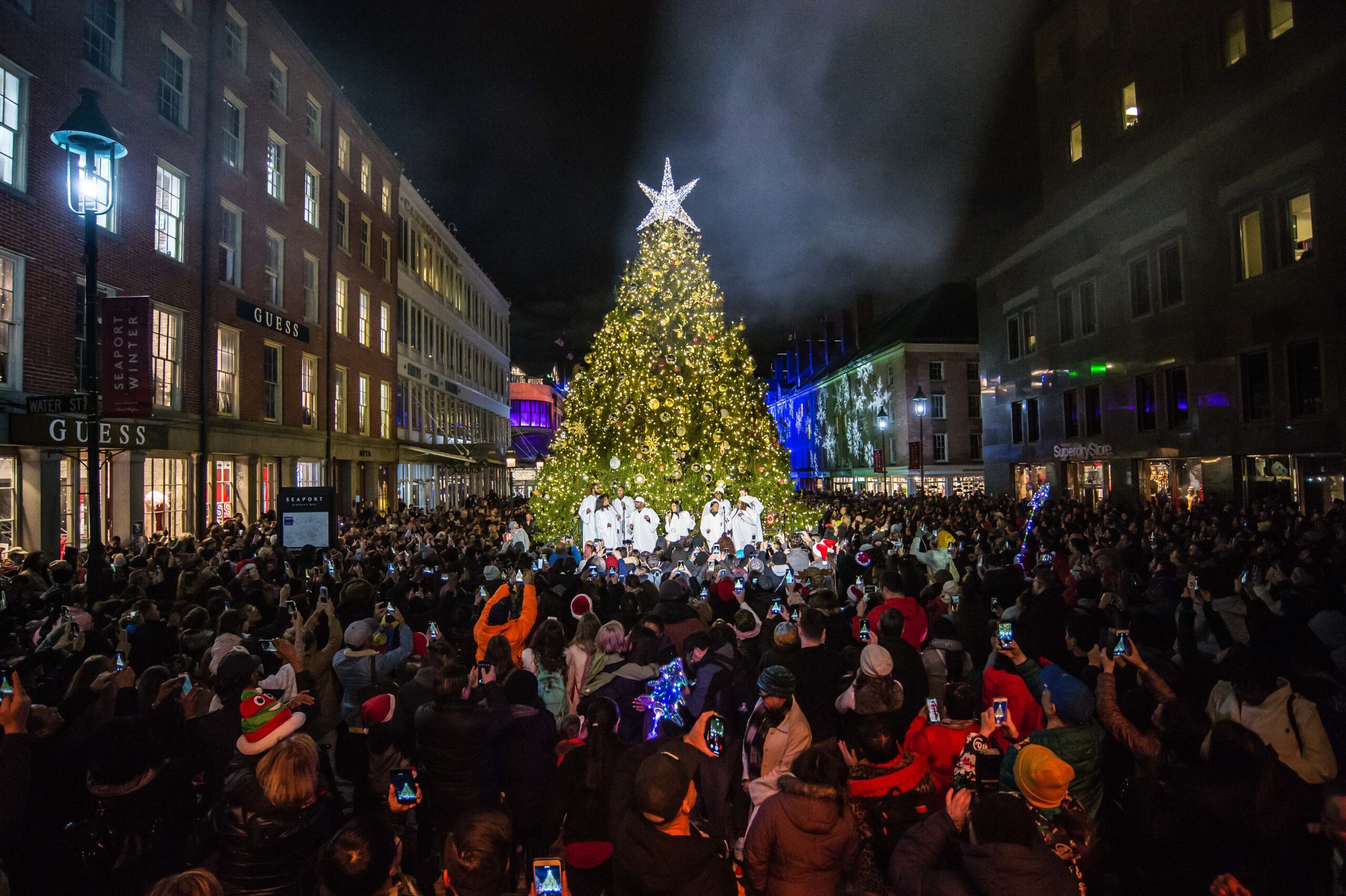 Crowd gathered at tree lighting at The Seaport during Christmas in NYC