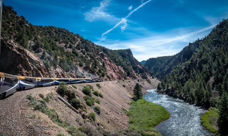 The Canyon Spirit train follows the Colorado River through the Rocky Mountains