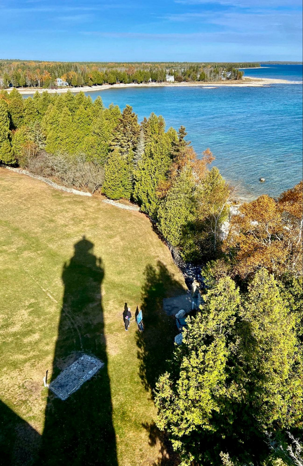 Cana Island lighthouse offers top views of the Door County while casting long shadows.