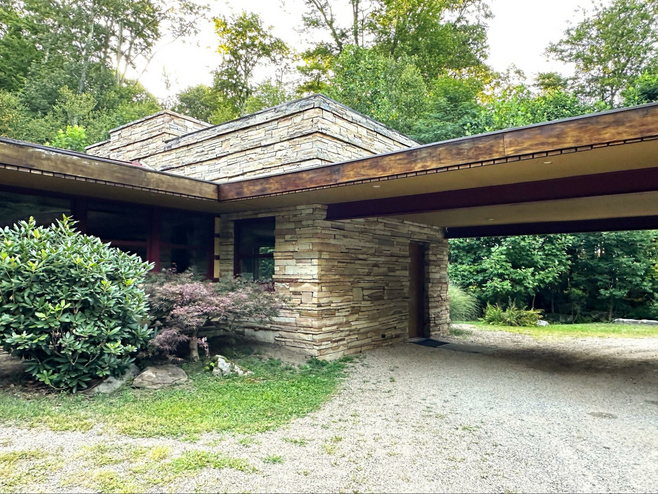 Duncan House car port and side entry.