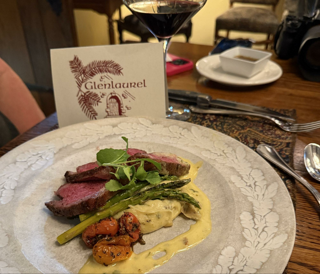 Entree at Glenlaurel Inn. Dry aged Ohio Proud Piedmontese Strip Steak, Yukon Cheddar Chive Mashed Potato, Truffle Brown Butter Asparagus, Roasted Heirloom Tomatoes and Sauce Bearnaise.