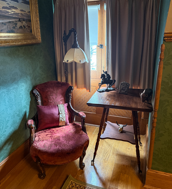 Red chair in Nagle Warren Mansion Guestroom
