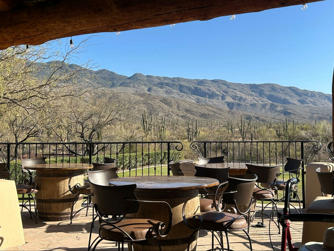 Outdoor patio overlooking the mountains at the Dog House Saloon at Tanque Verde Ranch.