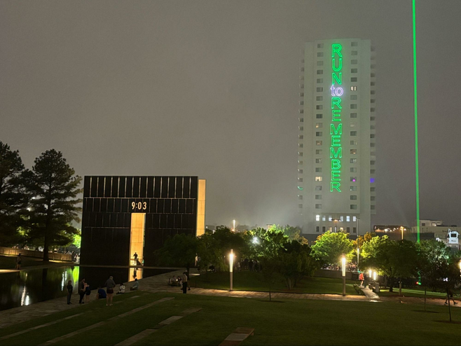 The Oklahoma City National Memorial lighted with the words "run to remember"