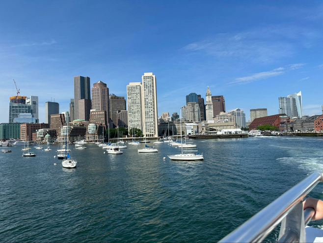 Image of the Boston harbor and skyline.
