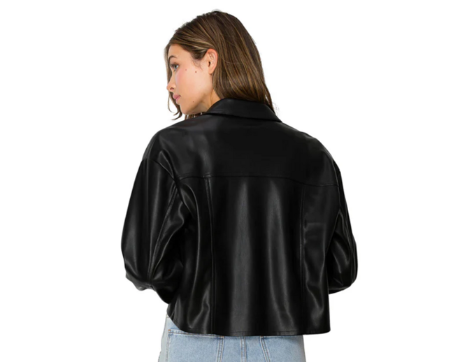 Woman wearing a black leather jacket