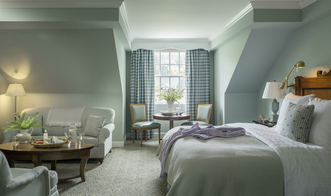 A guest room at Woodstock Inn & Resort